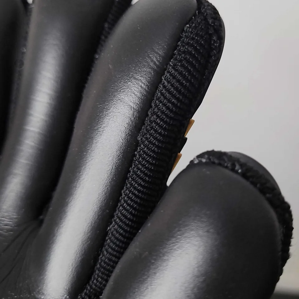 Close detail of Black Hexagon GK articulated finger spines
